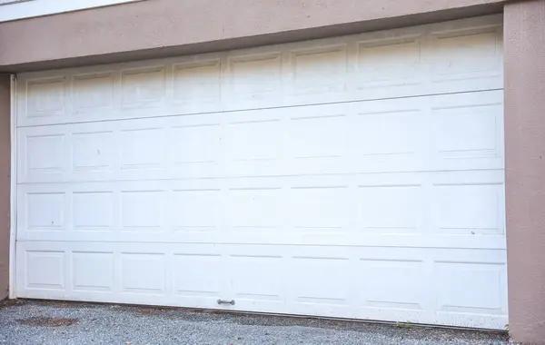Garage Door Malfunctions That Signal System Failure